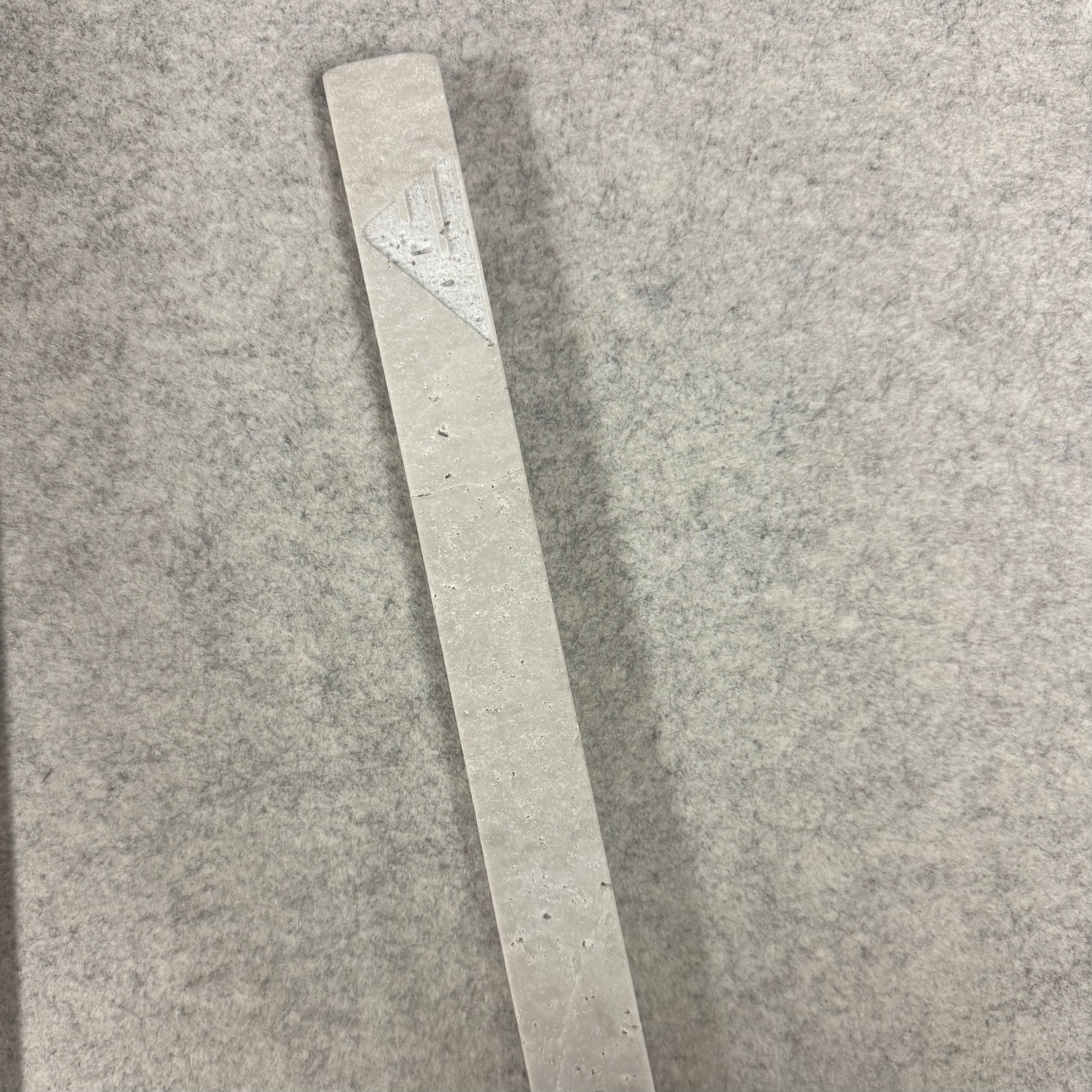 Grey Travertine | engraved shin