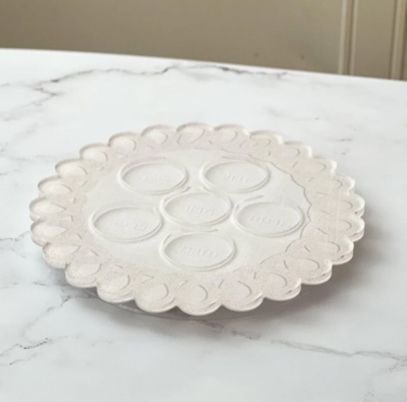 Linen style Seder plate with scalloped edge